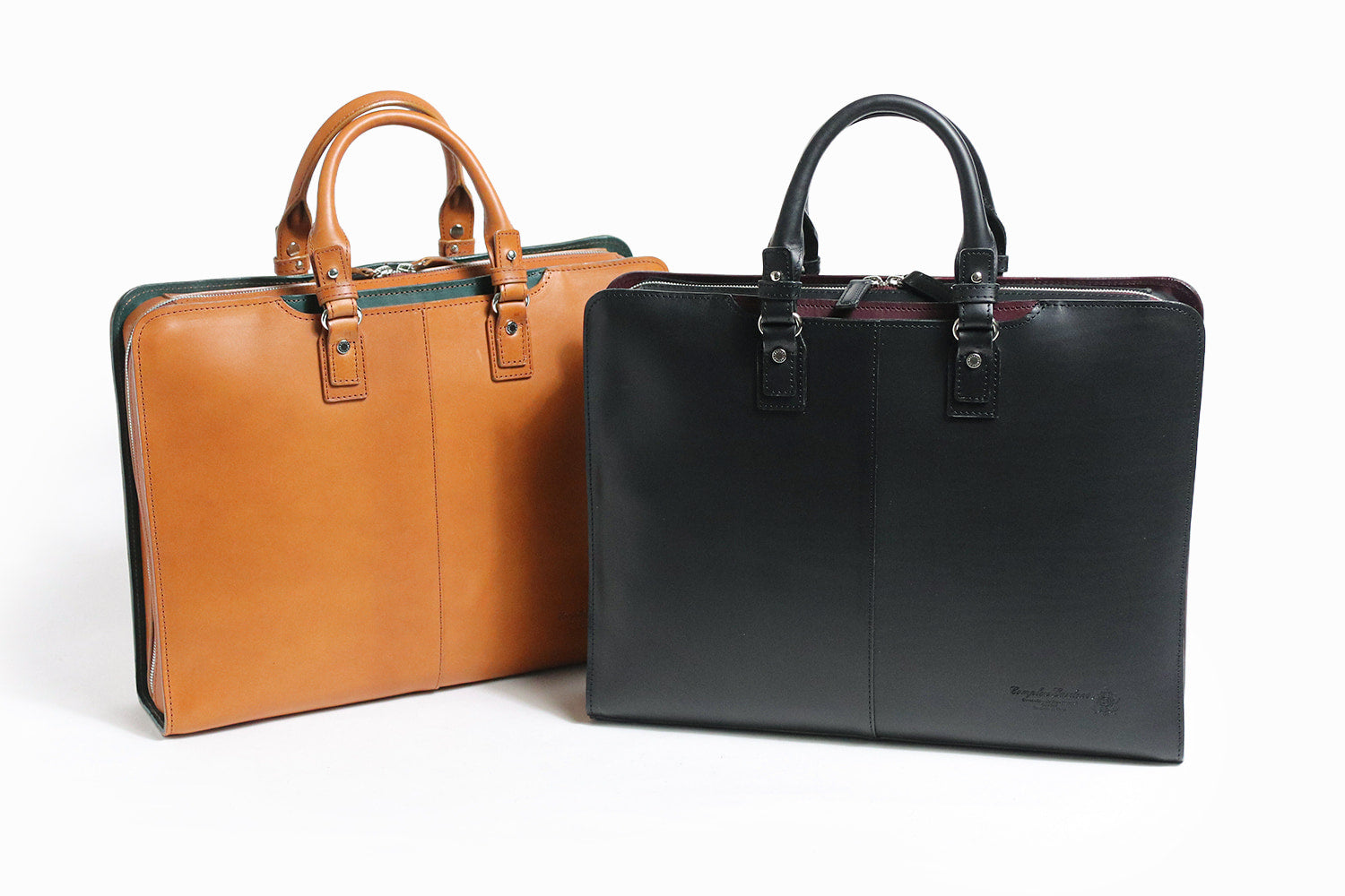 COMPLEX GARDENS / 眼蔵 ゲンゾウ 上質で肉厚なバケッタレザーを贅沢に使用したラウンドジップB4ブリーフケース