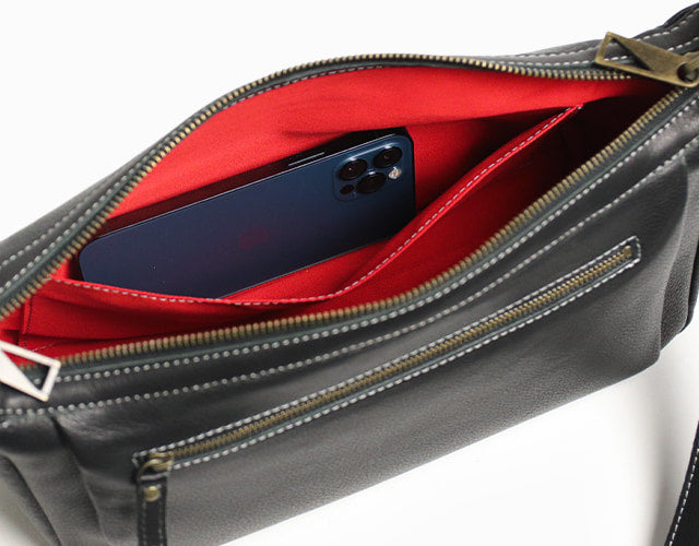 JYO ARVINISTA APRICA: Boldly designed shoulder bag made of soft, high-quality Japanese cowhide with belt details