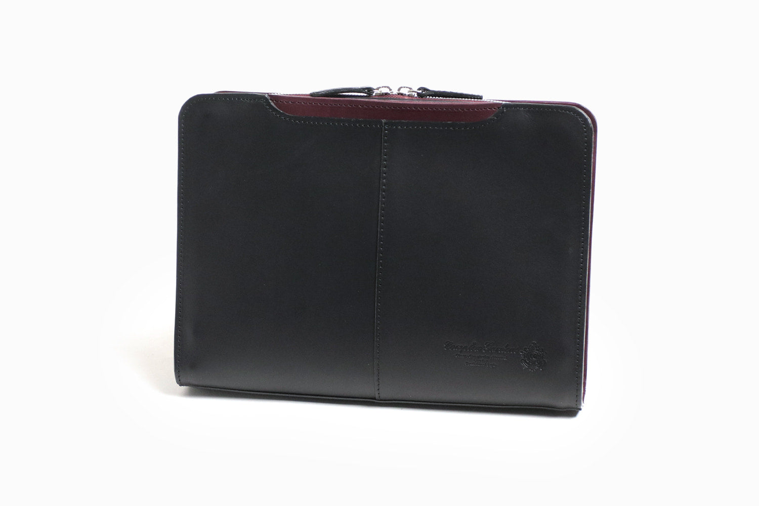 COMPLEX GARDENS / 眼蔵 ゲンゾウ  上質で肉厚なバケッタレザーを贅沢に使用したラウンドジップクラッチバッグ