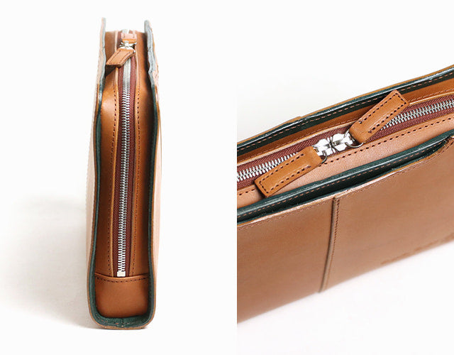 COMPLEX GARDENS / 眼蔵 ゲンゾウ  上質で肉厚なバケッタレザーを贅沢に使用したラウンドジップクラッチバッグ