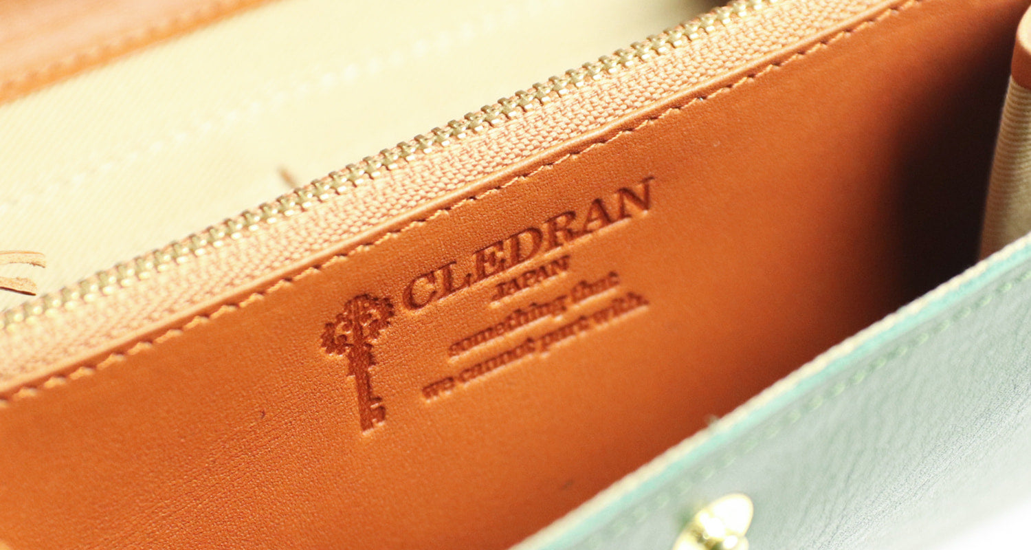 CLEDRAN  コンペ　表情豊かな牛革のカブセ長財布