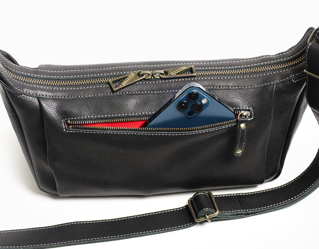 JYO ARVINISTA APRICA: Boldly designed shoulder bag made of soft, high-quality Japanese cowhide with belt details