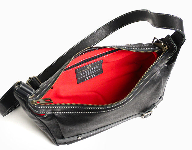 JYO ARVINISTA APRICA: Boldly designed shoulder bag made of soft, high-quality Japanese cowhide with belt details