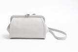 Atelier nuu / clay マットな質感で静かに佇む牛革。 洗練された曲線美が光るガマグチミニショルダー