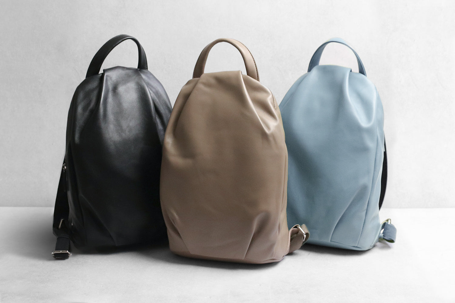 ARUKAN Lamoor Elegant lamb leather drape backpack 