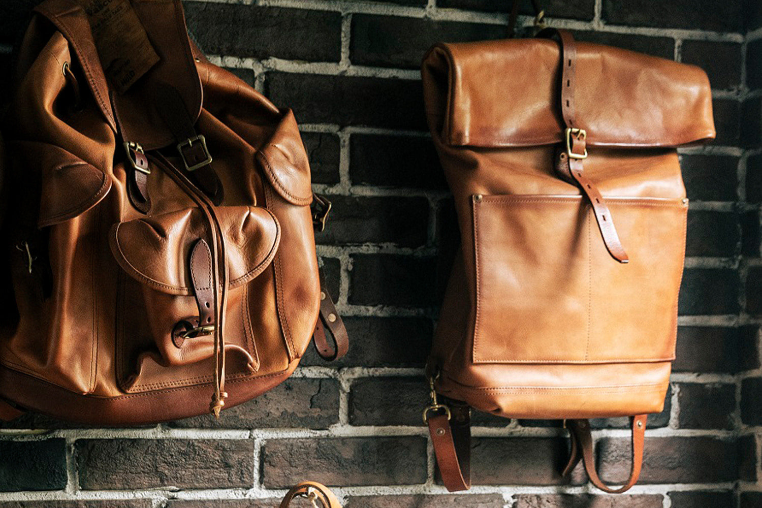 vasco / LEATHER ROLL TOP RUCKSACK