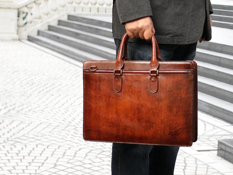 Lugard / G-3 One-of-a-kind shadow finish. A round zipper briefcase with a vintage feel.