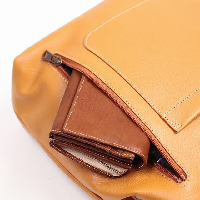 Atelier nuu / Parcel がま口のようにパカッとひらく「ダレス」モデルのリュックM
